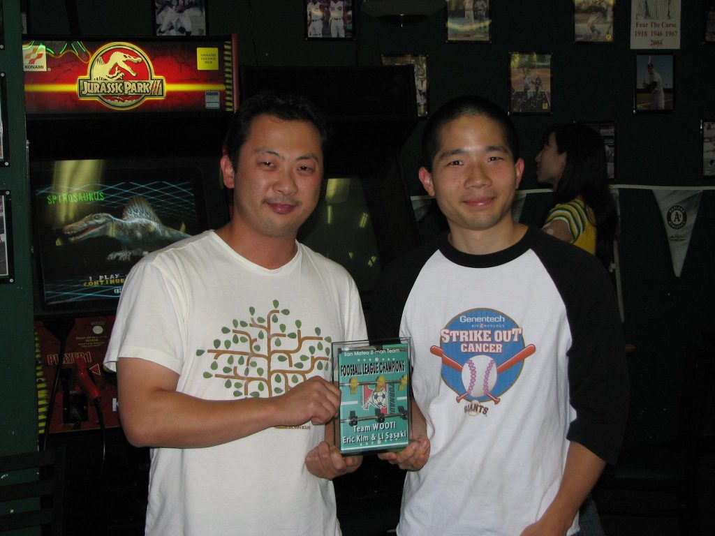 Li and Erik receiving their trophy after winning the 2007 San Mateo Foosball League.